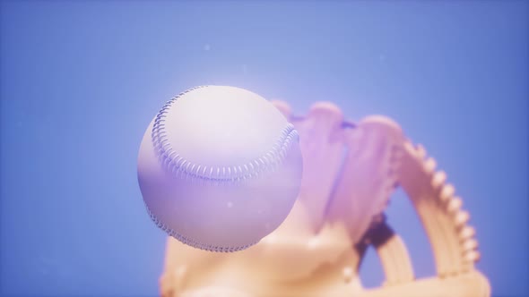 Baseball and Mitt at Blue Sky Background