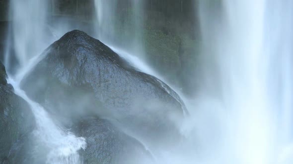 Waterfall On Black Rocks Closeup