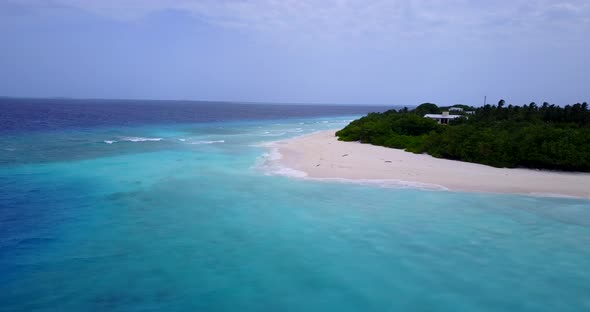 Beautiful aerial abstract shot of a white sandy paradise beach and aqua blue ocean background in hi 