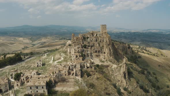 Aerial Drone Footage of Craco Horror town, creepy village, Basilicata, Italy 4K