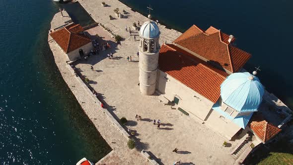 Tourists Walk Around the Island of Gospa Od Skrpjela