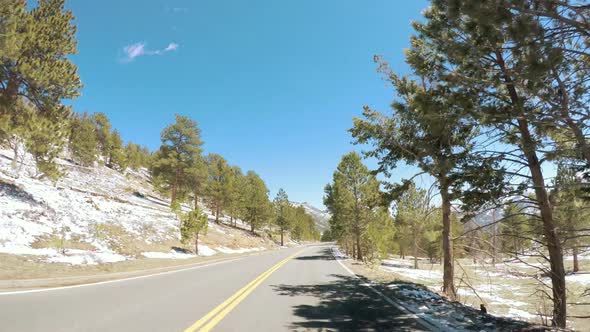 POV point of view -Driving through Rocky Mountain National Park in the Spring.