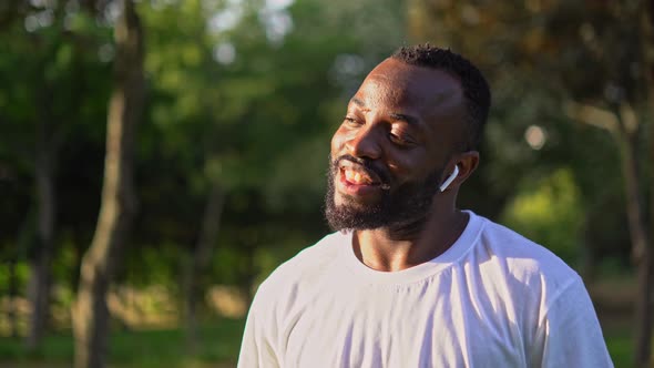 Portrait of Young African American Man Looking Directly at the Camera