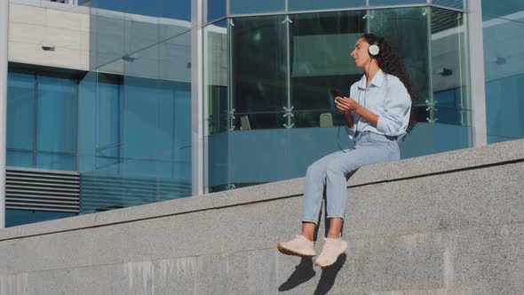 Happy Joyful Carefree Girl Student Young Woman with Earphones Pretty Lady Female Listening to Music