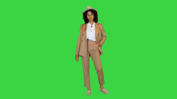 Beautiful Black Lady Wearing a Hat Posing on a Green Screen Chroma Key