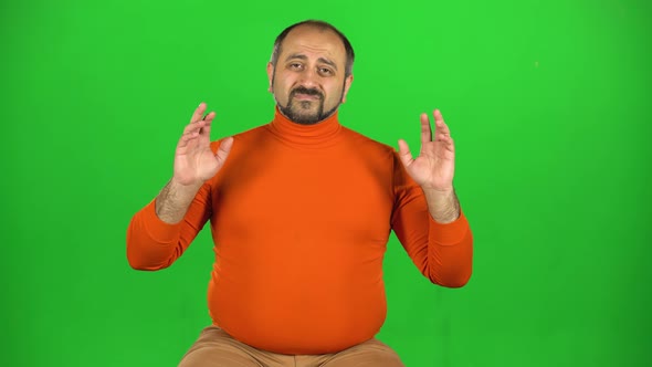 Caucasian Man Throws Up His Hands and Squirms His Face, Feels Disappointed. Green Screen