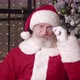 Goodnatured Santa Claus in His Residence Against the Background of a Beautiful Christmas Tree - VideoHive Item for Sale