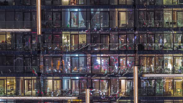 Flat Night Panorama of Multicolor Light in Windows of Multistory Buildings Aerial Timelapse