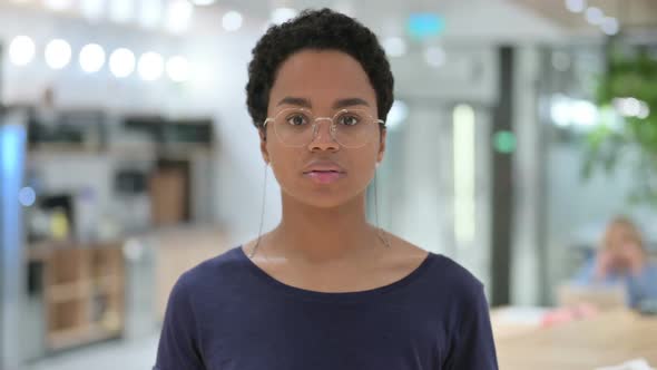 Portrait of Serious Casual African Woman Looking at the Camera