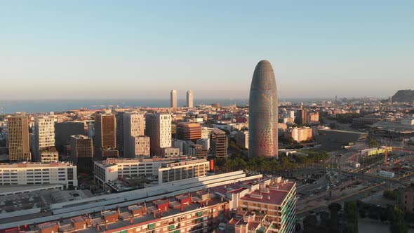 Drone shot of Torre Glories Barcelona (Agbar) at sunset