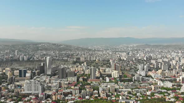 	Turtle lake road with cyclists and Vake district area in Tbilisi