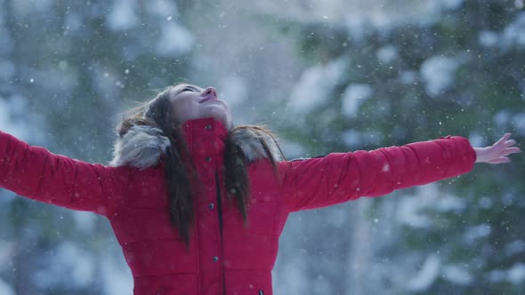 Girl enjoying a snowy day