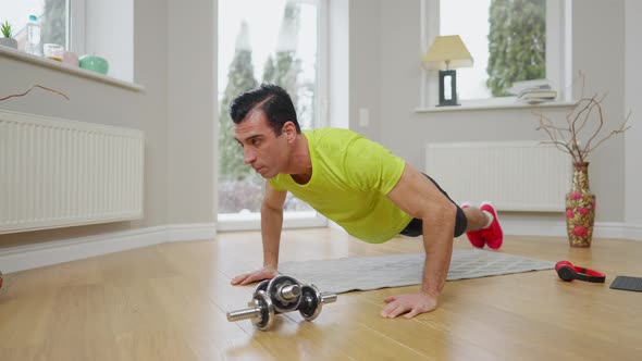 Wide Shot of Confident Handsome Sportsman Doing Pushups at Home Indoors