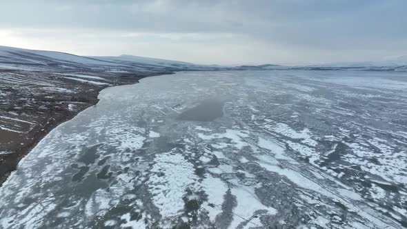 Aerial view of frozen Lake Paravani. The largest lake in Georgia