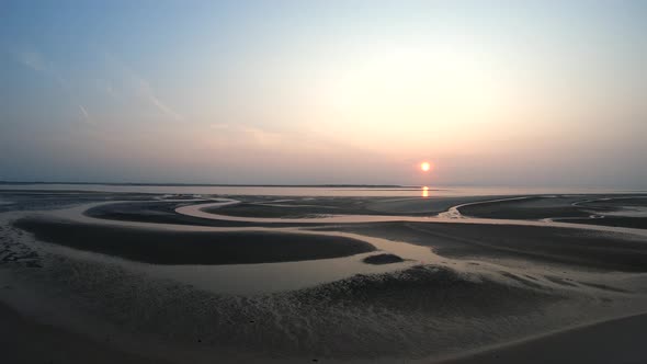 Beautiful beach patterns at the sunset in Langeoog, Germany