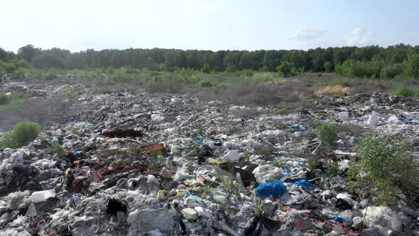 Aerial Flying Over Piles Of Plastic Garbage And Household Waste In A Landfill