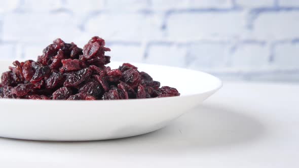 Dried Cranberries in a Plate on Table