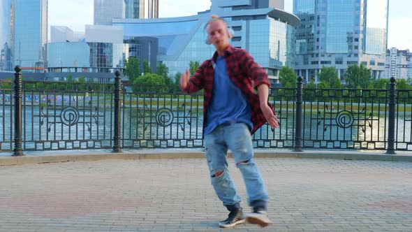 Red Bearded Guy Performing Modern Dance at Street