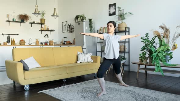 Young asian woman smile doing yoga exercises in home, exercising muscles for body health care