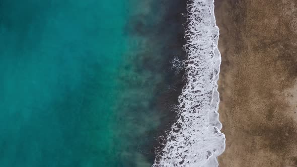 Top View of the Desert Black Beach on the Atlantic Ocean