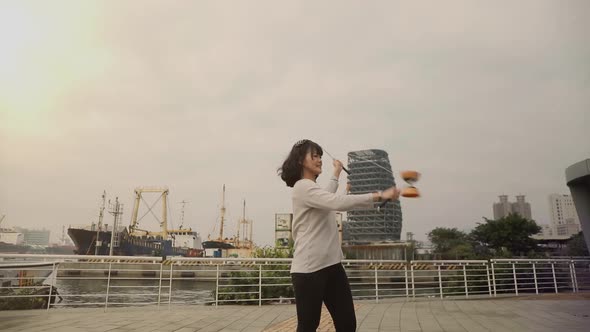 Taiwanese woman playing with a Chinese Yo-Yo