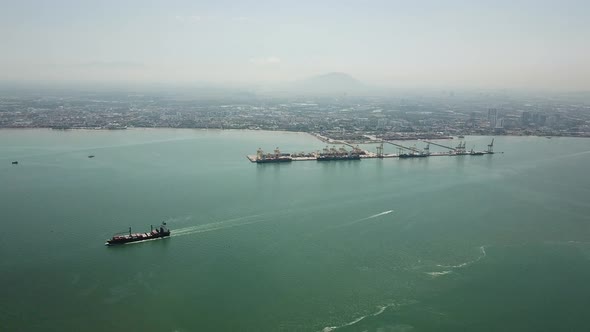 Container ship leaving container terminal Butterworth.