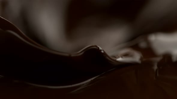 Super Slow Motion Shot of Waving Melted Milk Chocolate at 1000 Fps