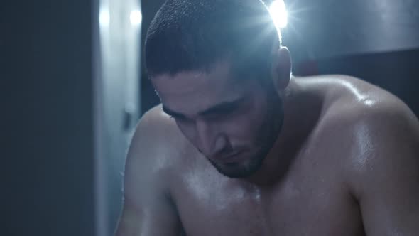 Sweaty Boxer Resting after Training