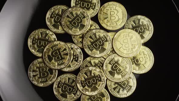 Rotating shot of Bitcoins (digital cryptocurrency) - BITCOIN 0529