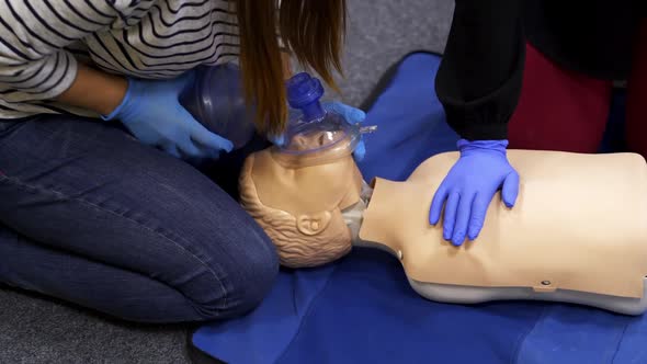 Training reanimation procedure on a mannequin.