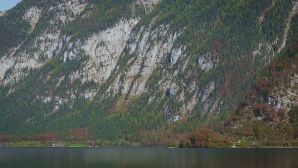 Famous Tourist Destination Serene Town Hallstatt in Mountains Alps in Autumn. Cathedral Church