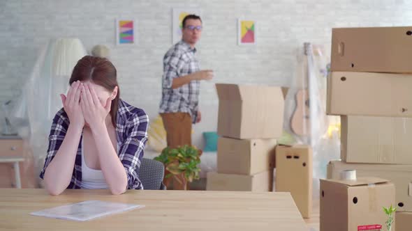 Woman and Man Breakup or Divorce Moving Boxes