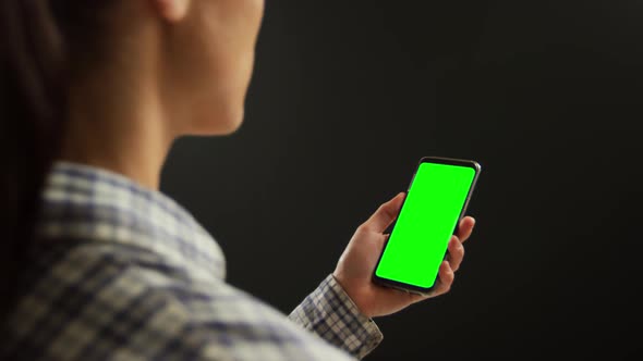 Young woman using smartphone