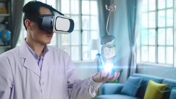 Doctor Using Vr Glasses Virtual Reality Working With Holographic Digestive System