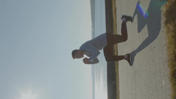 Man Is Doing Forward Lunges with Jumps