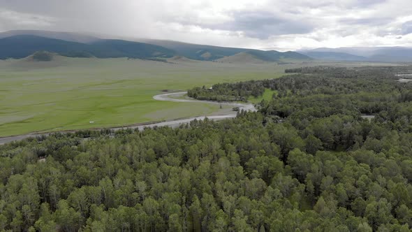 Trees, Forest and Vast Meadow in The Big River in Wide Valley of Asia Geography