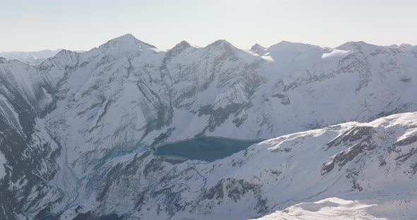 Drone Flight In Winter Over Kitzsteinhorn Mountain Peaks