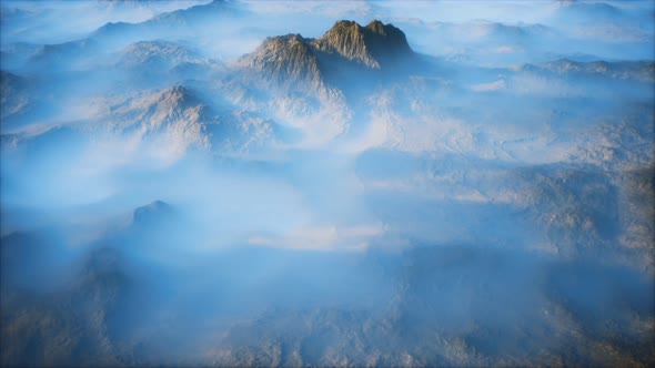 Distant Mountain Range and Thin Layer of Fog on the Valleys