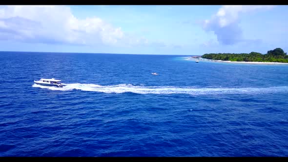 Aerial top down panorama of beautiful island beach trip by blue ocean and white sandy background of 