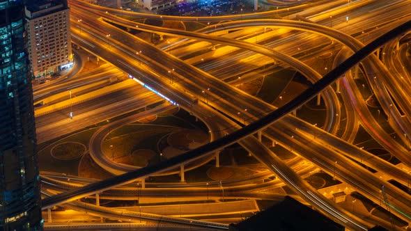 Night Dubai Traffic Junction Time Lapse. Pan Up