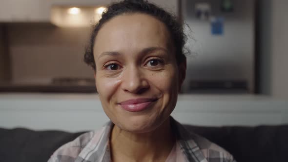 Woman Crying of Happiness Gratitude Wiping Tears with Hand Indoors