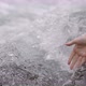 Hand touching water in the forest river or lake. People travel enjoying nature and life concept. - VideoHive Item for Sale