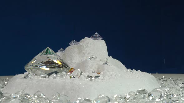 Diamonds On The Turning Platform With Snow Background