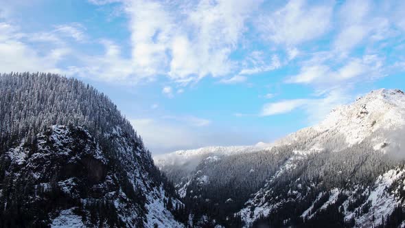 Aerial view of Snoqualmie Pass summit covered in snow.