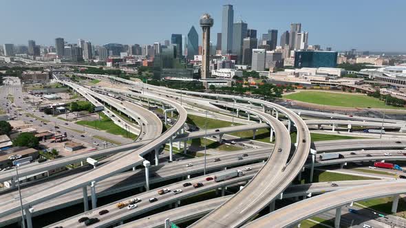 Commuter traffic entering downtown Dallas Texas. Urban city in USA. Aerial view with highway congest