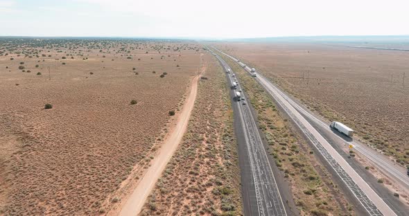 Aerial view of Arizona mountains in across high speed highway