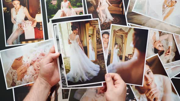 Hands Lay Out Wedding Photos