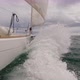 Sailboat Sailing with Huge Waves Breaking to the Camera - VideoHive Item for Sale