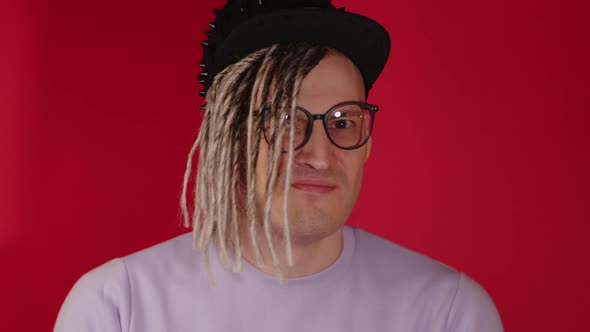 Young Handsome Man in Black Cap Glasses Nodding Head with Disagreement