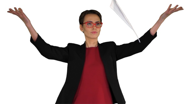 Businesswoman in Glasses Is Scattering Documents on White